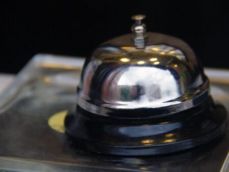 table bell is in the reception at the hotel