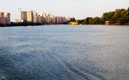 view of the evening city on the riverの写真素材