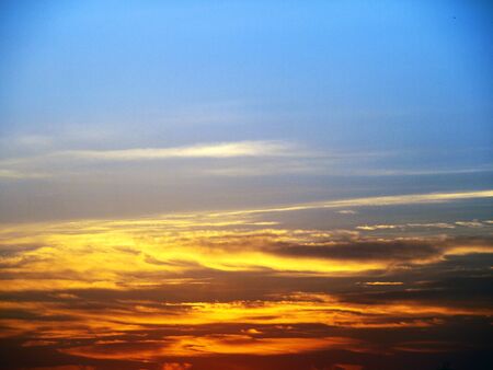 beautiful and charming red orange sunset skyの写真素材