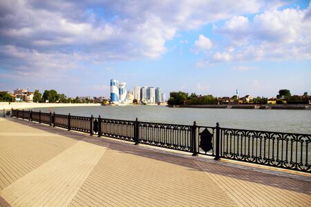 Beautiful view of the city with the river from the pierの写真素材
