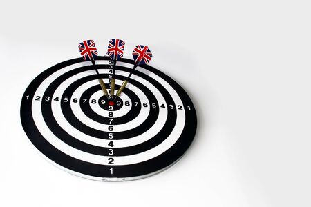 A game of darts with three flags of England on a white background