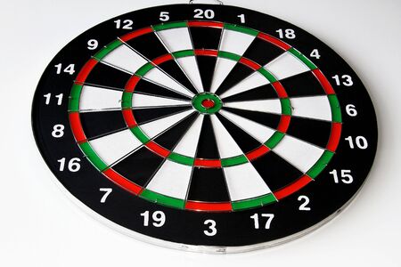 Playing darts on a white background, isolateの写真素材