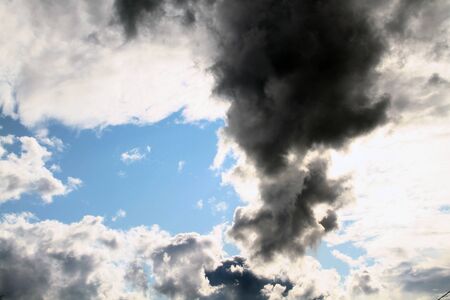 Air clouds in the blue sky. Nature background