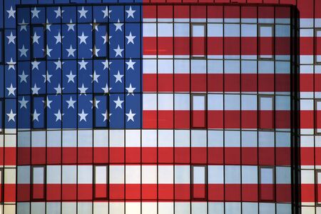 US flag on a background wall texture.の写真素材