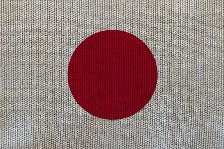 Japan flag on the background texture. Concept for designer solutions.の写真素材