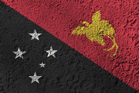 Papua New Guinea flag on the background texture. Concept for designer solutions.の写真素材