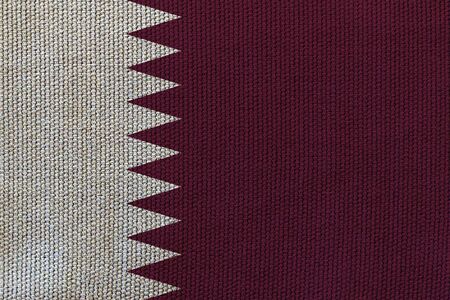 qatar flag on the background texture. Concept for designer solutions.の写真素材