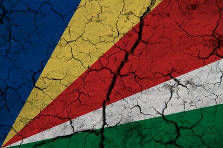 Seychelles flag on the background texture. Concept for designer solutions.の写真素材