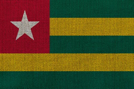 togo flag on the background texture. Concept for designer solutions.の写真素材