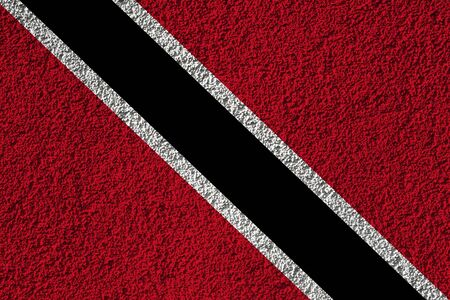 Trinidad and Tobago flag on the background texture. Concept for designer solutions.の写真素材