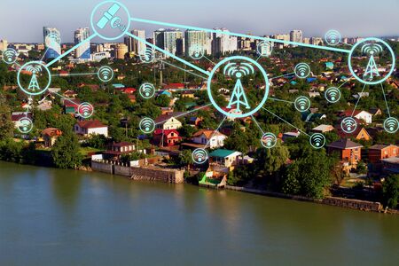 IOT, Internet smart city and network connect Wi-Fi access points. Background and Wi-Fi icons on the background of the city.の写真素材