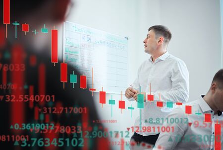 A group of people analyze the stock market. Business and finance, technology, cryptocurrency, stock...