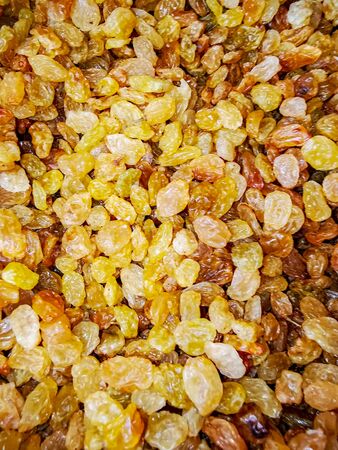 Macro photo of dry yellow raisins. Pictures fruit food dried raisinsの写真素材