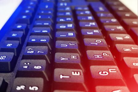 Black and computer keyboard close-up. Overlooking the enter button
