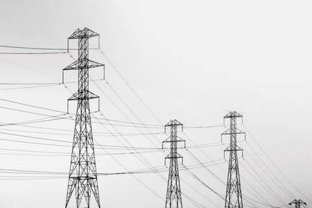 Overhead power line. A series of electric cornices extending into the distance. Electricity...