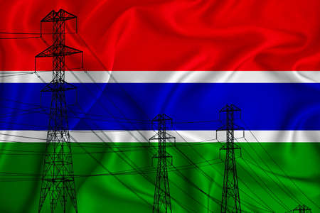 Gambia flag in the background Conceptual illustration and silhouette of a high voltage power line in the foreground a symbol of the upcoming energy crisis. 3d renderingの写真素材