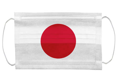 Japan flag on a medical mask. Isolated on a white background. for corona virus or covid-19,...