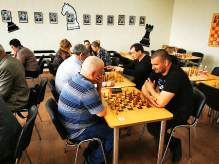 Chess tournament. Tables with chess board games for ideas and competition. Strategy, Management or Leadership Conceptのeditorial素材