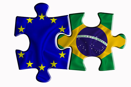 Brazil flag and European Union flag on two puzzle pieces on white isolated background. The concept of political relations. 3D renderingの写真素材