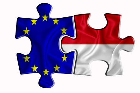 Indonesia flag and European Union flag on two puzzle pieces on white isolated background. The concept of political relations. 3D renderingの写真素材