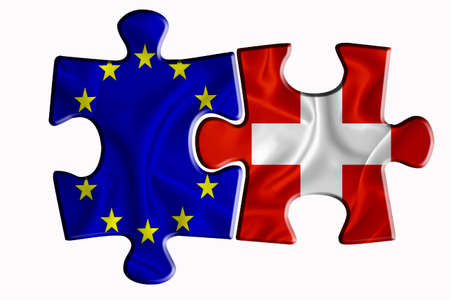 Switzerland flag and European Union flag on two puzzle pieces on white isolated background. The concept of political relations. 3D renderingの写真素材