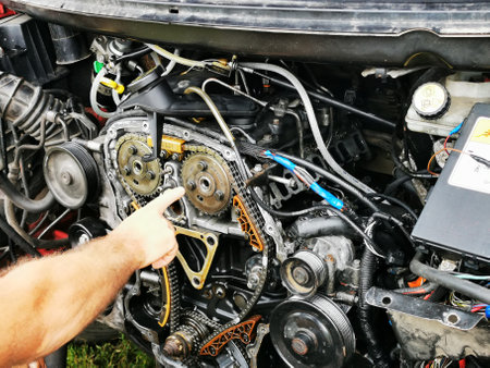 Repair of the internal combustion engine of a passenger car. repair of an open motor gear replacement.の写真素材