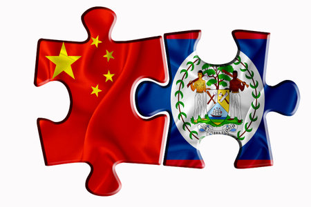 Belize flag and China of America flag on two puzzle pieces on white isolated background. The concept of political relations. 3D renderingの写真素材