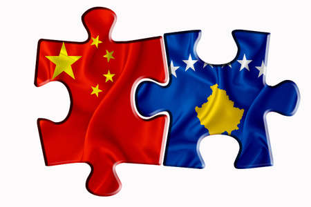 kosovo flag and China of America flag on two puzzle pieces on white isolated background. The concept of political relations. 3D renderingの写真素材