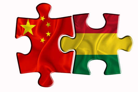 Bolivia flag and China of America flag on two puzzle pieces on white isolated background. The concept of political relations. 3D renderingの写真素材
