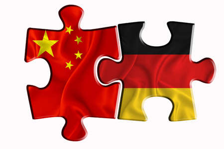 germany flag and China of America flag on two puzzle pieces on white isolated background. The concept of political relations. 3D renderingの写真素材