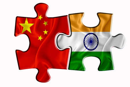 India flag and China of America flag on two puzzle pieces on white isolated background. The concept of political relations. 3D renderingの写真素材