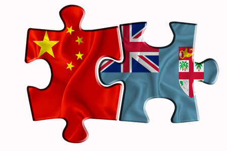 Fiji flag and China of America flag on two puzzle pieces on white isolated background. The concept of political relations. 3D renderingの写真素材