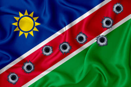 Namibia flag Close-up shot on waving background texture with bullet holes. The concept of design solutions. 3d renderingの写真素材