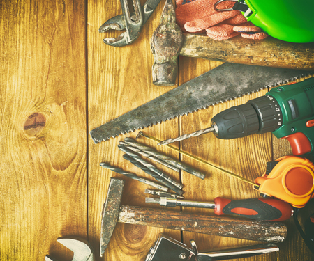 Set of different building equipments on the wooden tableの写真素材