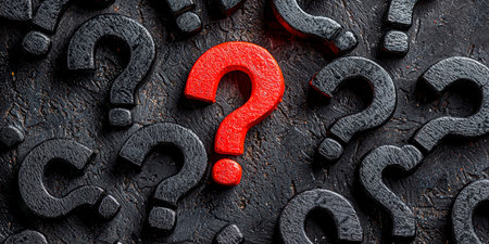 Concept illustration of the red question mark stands out against the black, symbolizing urgency and importance.の素材