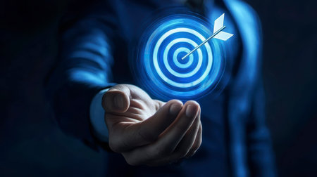 Concept illustration of a businessman holding a target with an arrow, symbolizing success and achieving goals in digital marketingの素材