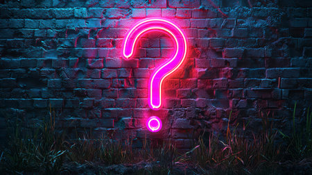 A dark brick wall with neon question marks symbolizes an evening of games and reflection.の素材
