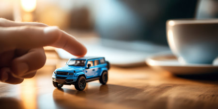 Car insurance protection concept with blue car model and security shield icon.の素材