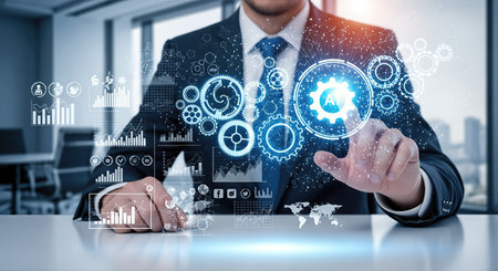 A businessman adjusts glowing holographic gears, symbolizing automation, teamwork, and advanced technology in modern industry.の素材