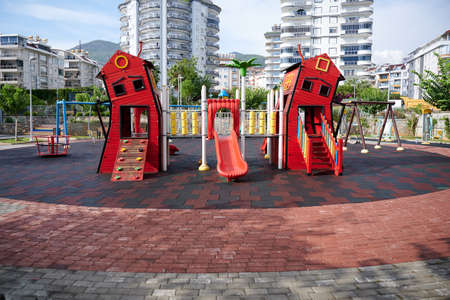 Beautiful original playground with interesting houses and slidesの写真素材