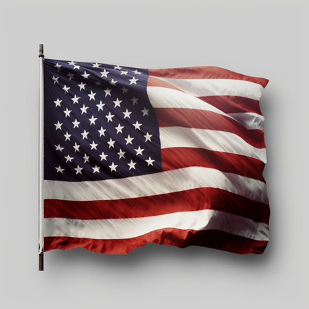 United States of America flag waving in the wind isolated on white backgroundの素材