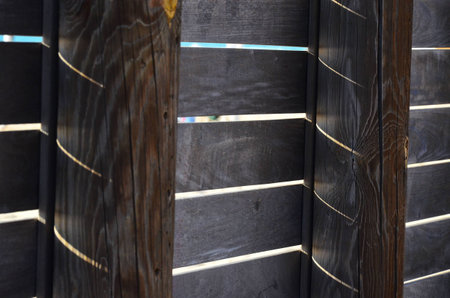 Fence made of wood with very beautiful patternsの写真素材