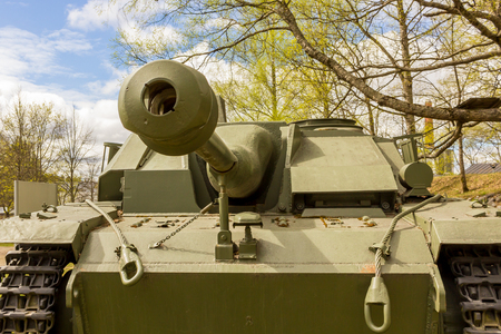 Closeup front view of old green olive tank from World War 2 in museumの写真素材