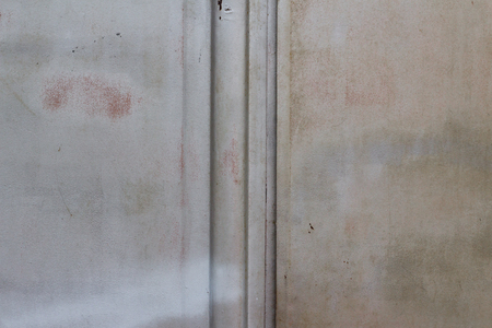 Background texture gray metallic rusty garage door with copyspaceの写真素材