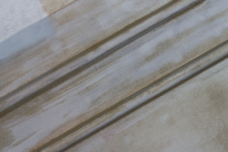 Abstract background texture with dirty blue and rusty brown colors and diagonal pattern with feel of motionの写真素材