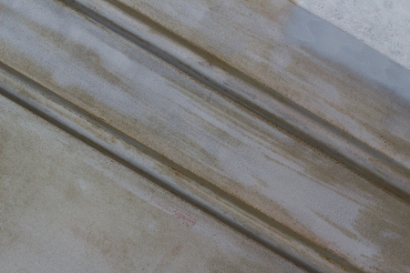 Abstract background texture with dirty blue and rusty brown colors and diagonal pattern with feel of motionの写真素材