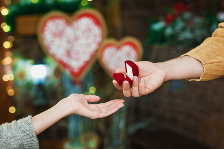 guy present girl ring on Valentines Dayの写真素材