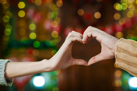hands in shape of love heartの写真素材