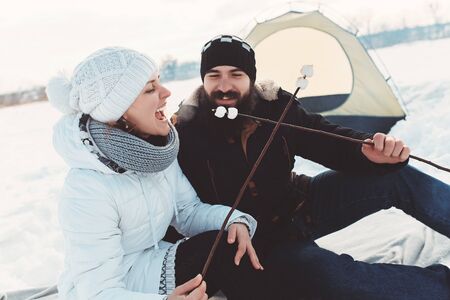 Lovers have a good time at winter holidayの写真素材