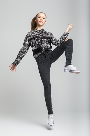 Young pretty girl jumpの写真素材